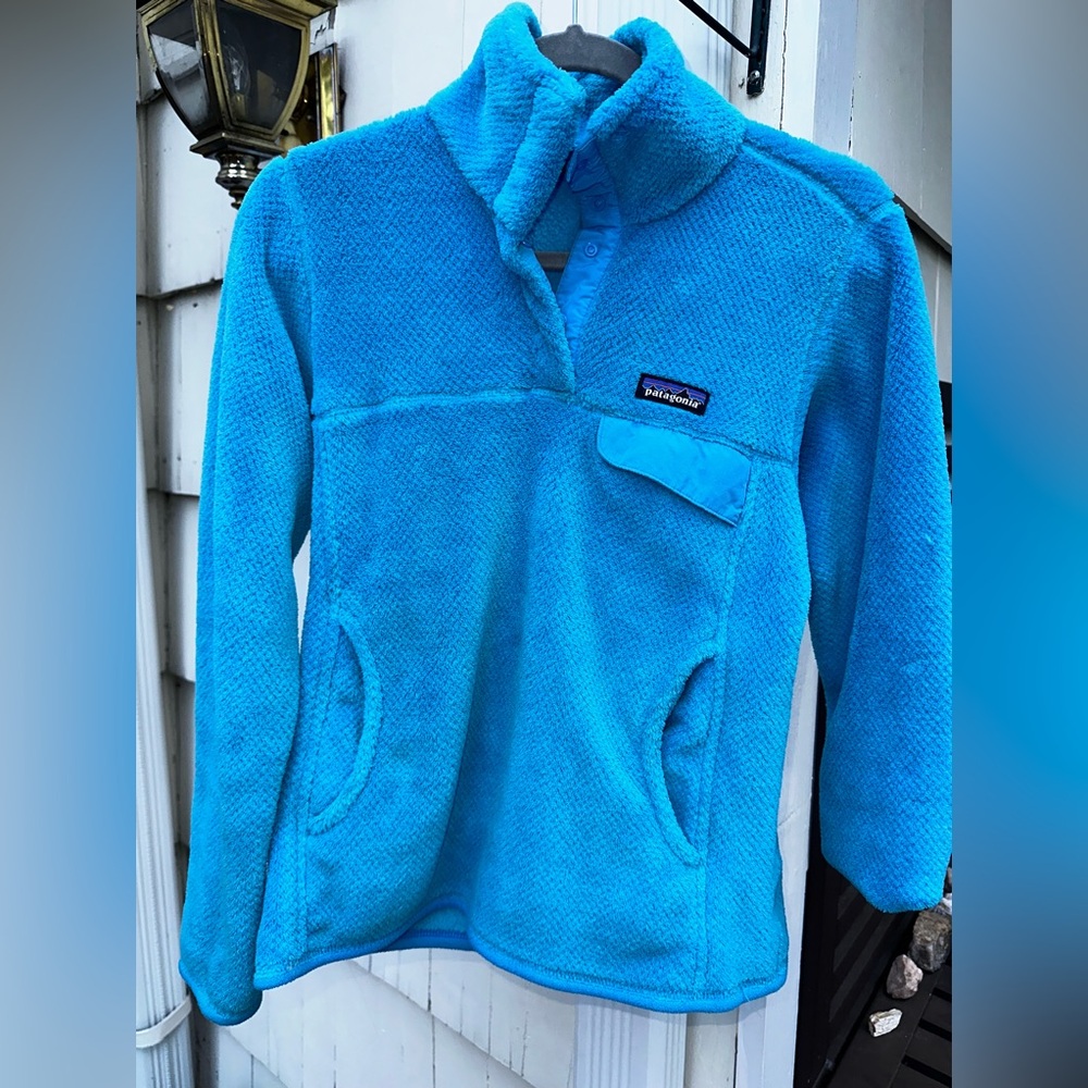 Patagonia women’s Small re-tool fleece jacket turquoise blue. Perfect condition